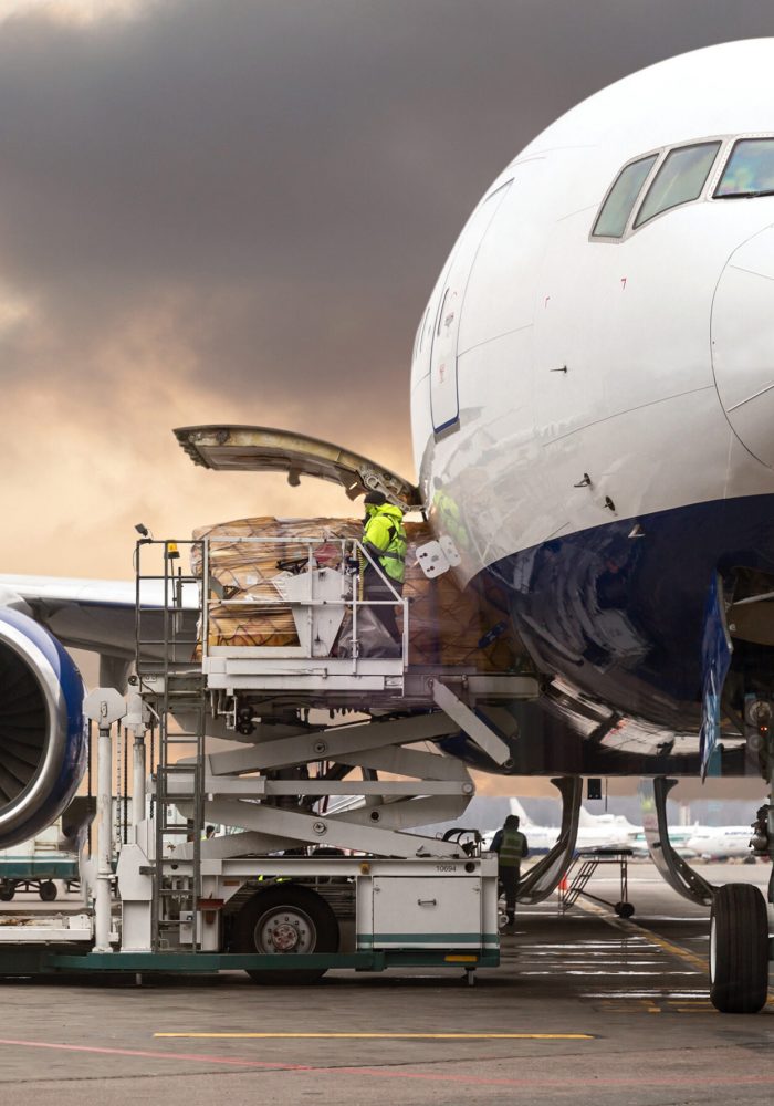 loading cargo into the aircraft before departure